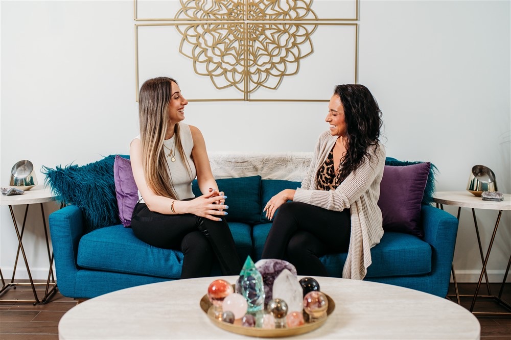 Christina consulting with a client