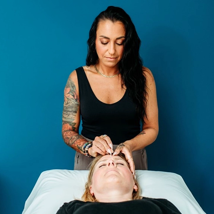Christina Dwyer at Vitality Wellness in Park Ridge, Illinois Acupuncture on Forehead